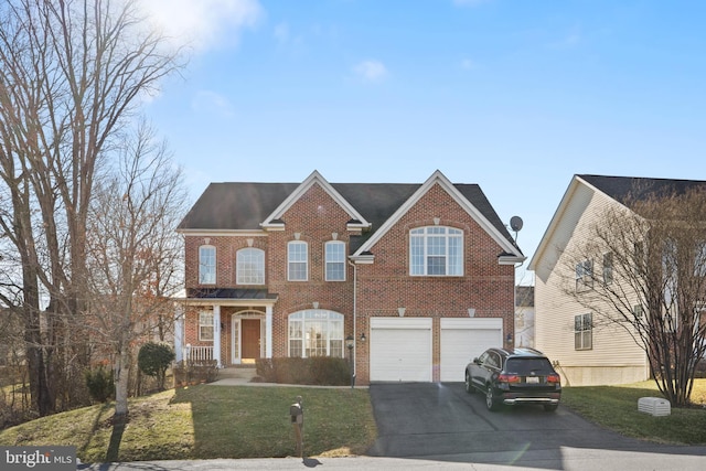 view of front of home featuring aphalt driveway, brick siding, an attached garage, and a front lawn