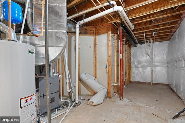 unfinished below grade area featuring water heater