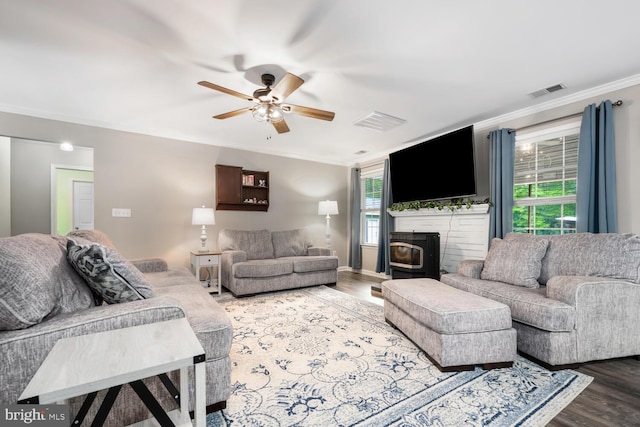 15185 Day Rd, Goldsboro, MD 21636 - living area with wood finished floors, ceiling fan, ornamental molding, and a fireplace