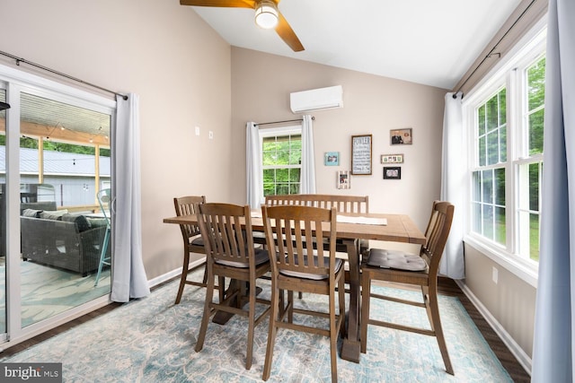 15185 Day Rd, Goldsboro, MD 21636 - dining area with lofted ceiling, wood finished floors, a wall mounted air conditioner, ceiling fan, and baseboards