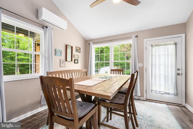15185 Day Rd, Goldsboro, MD 21636 - dining space with a wall unit AC, baseboards, wood finished floors, a ceiling fan, and vaulted ceiling