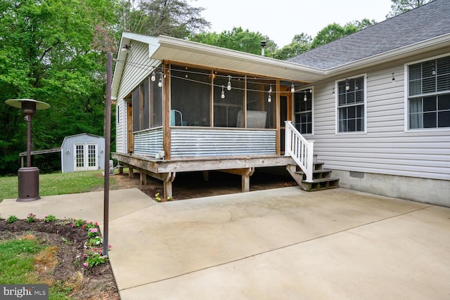 15185 Day Rd, Goldsboro, MD 21636 - view of front of house with a sunroom, crawl space, roof with shingles, an outdoor structure, and a patio area