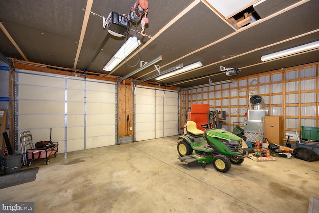 15185 Day Rd, Goldsboro, MD 21636 - garage featuring a garage door opener