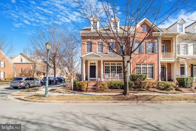 view of property featuring brick siding