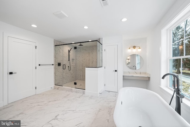 bathroom featuring marble finish floor, recessed lighting, visible vents, a shower stall, and a freestanding tub