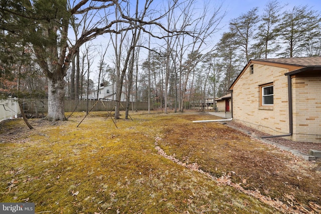 view of yard featuring fence