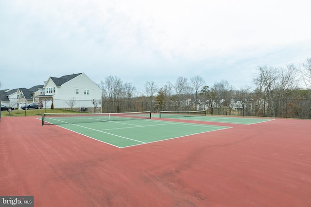 view of sport court featuring community basketball court and fence