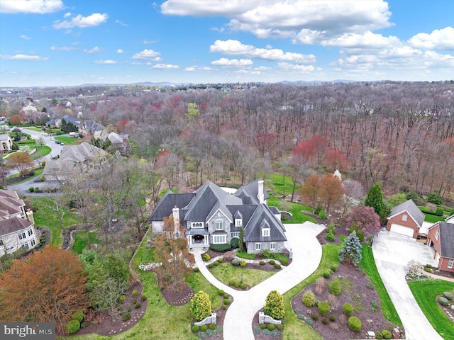 aerial view featuring a view of trees