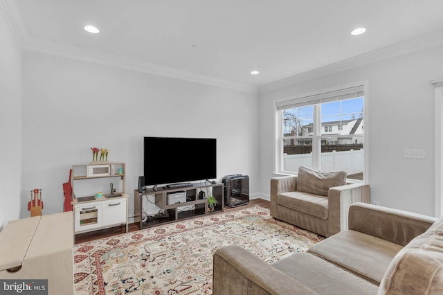 living area with ornamental molding, recessed lighting, baseboards, and wood finished floors