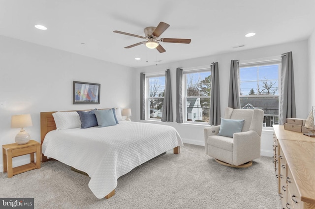 bedroom featuring visible vents, baseboards, light colored carpet, ceiling fan, and recessed lighting