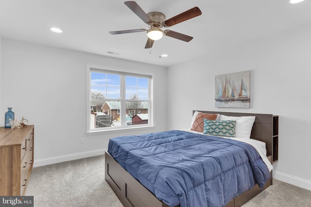 bedroom with carpet floors, recessed lighting, visible vents, and baseboards