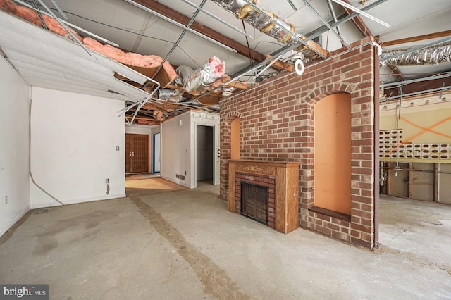 basement with a fireplace