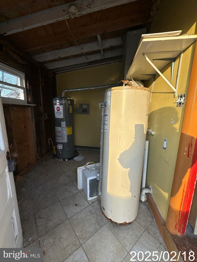 utility room with water heater