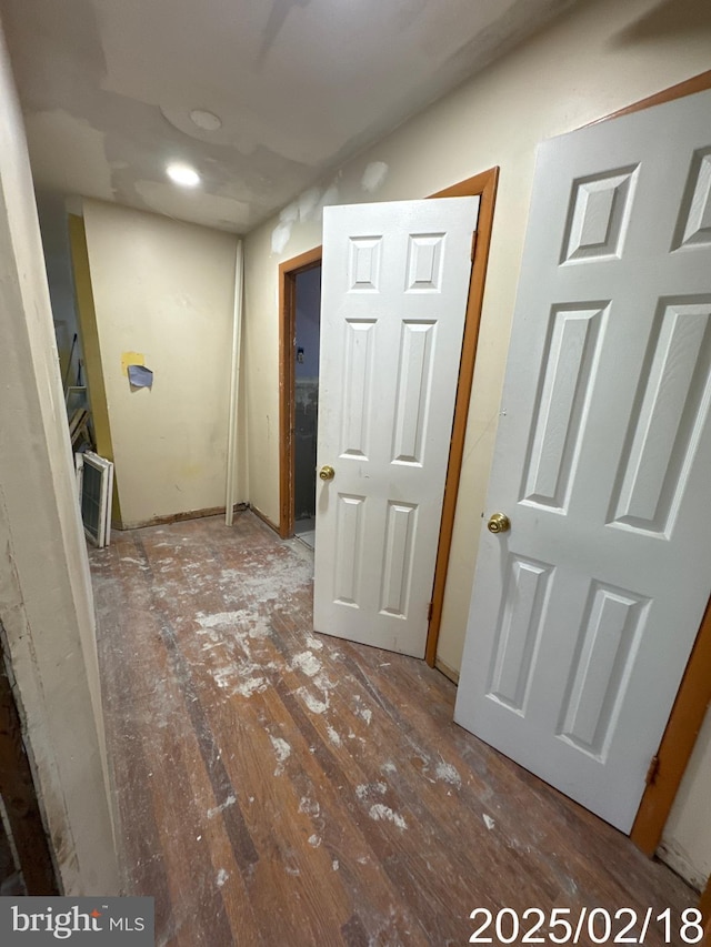 hallway featuring wood finished floors