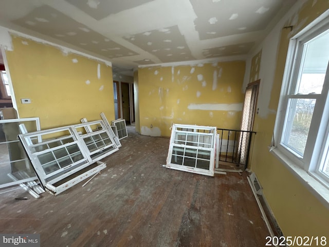 empty room featuring dark wood-type flooring