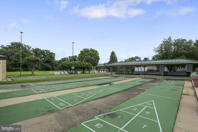 view of home's community with shuffleboard