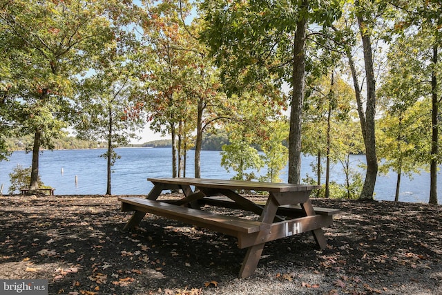 view of home's community with a water view