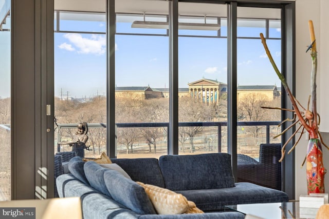 interior space with a healthy amount of sunlight and a rural view