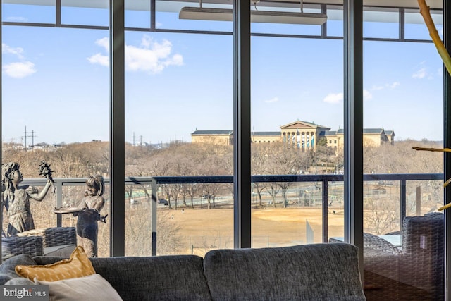 interior space featuring plenty of natural light and floor to ceiling windows