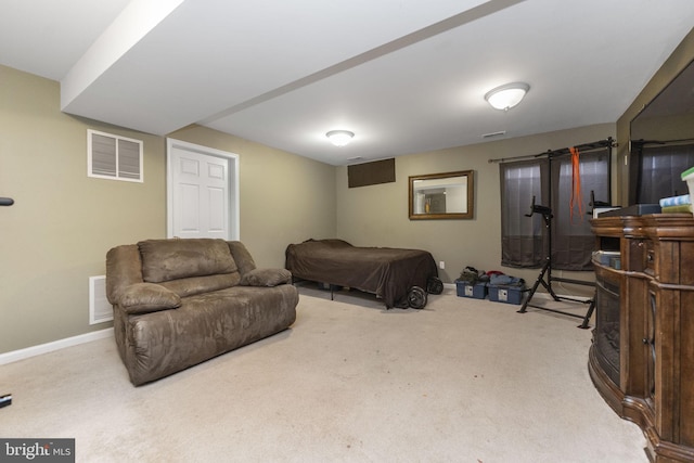 bedroom with carpet, visible vents, and baseboards