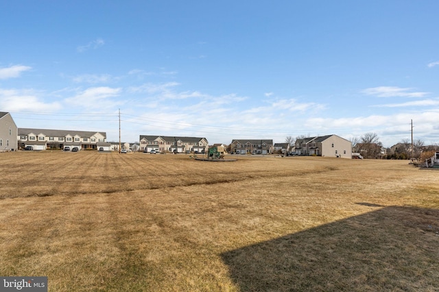 view of yard featuring a residential view