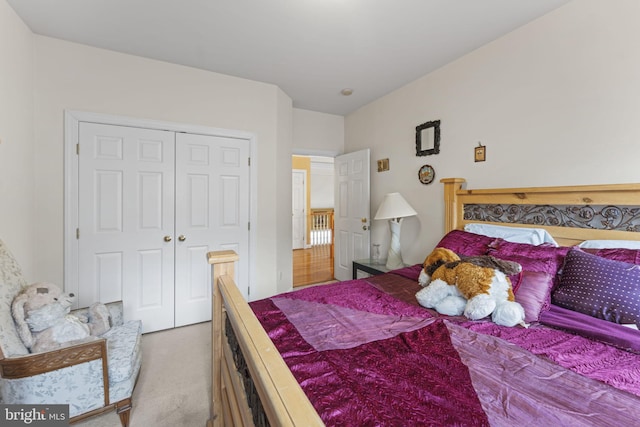 carpeted bedroom featuring a closet