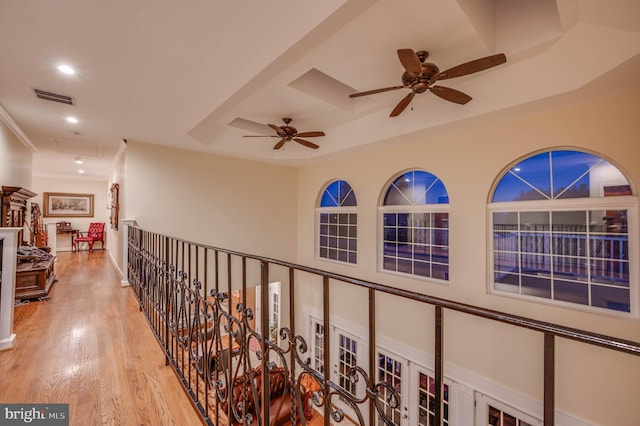 corridor with recessed lighting, visible vents, and wood finished floors