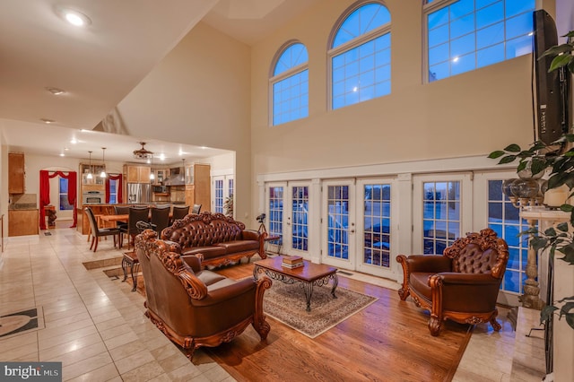 living area featuring french doors and wood finished floors