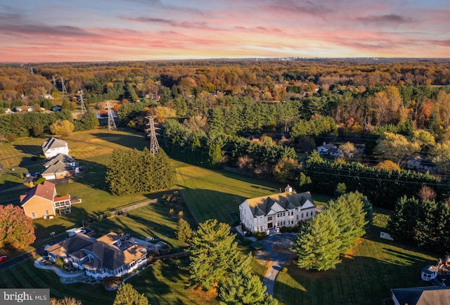 aerial view featuring a view of trees