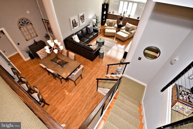 living room featuring baseboards and wood finished floors