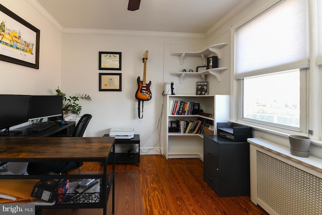 home office with radiator, a ceiling fan, dark wood-style flooring, and crown molding