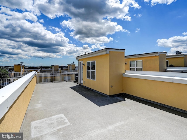 view of patio / terrace with a balcony