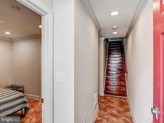 stairway with ornamental molding, recessed lighting, and baseboards