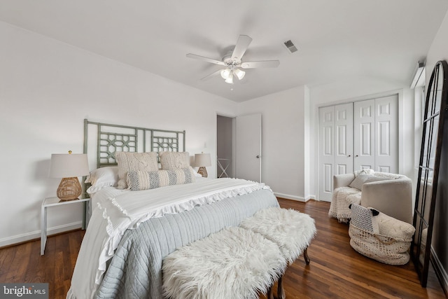 bedroom featuring baseboards, visible vents, ceiling fan, wood finished floors, and a closet