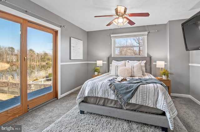 bedroom featuring a ceiling fan, carpet flooring, and baseboards