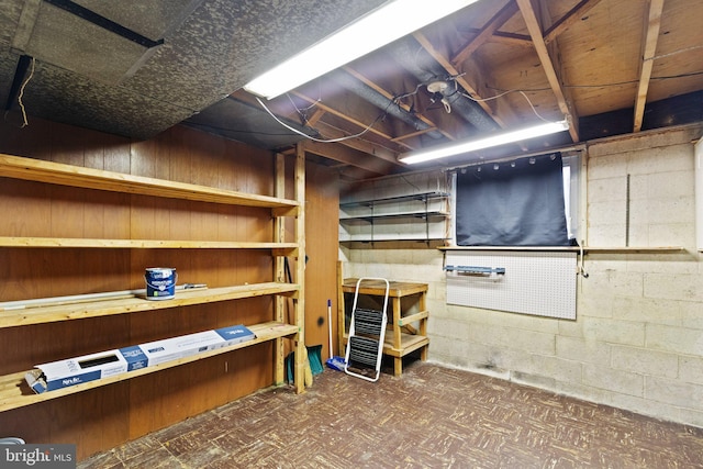 unfinished basement with tile patterned floors