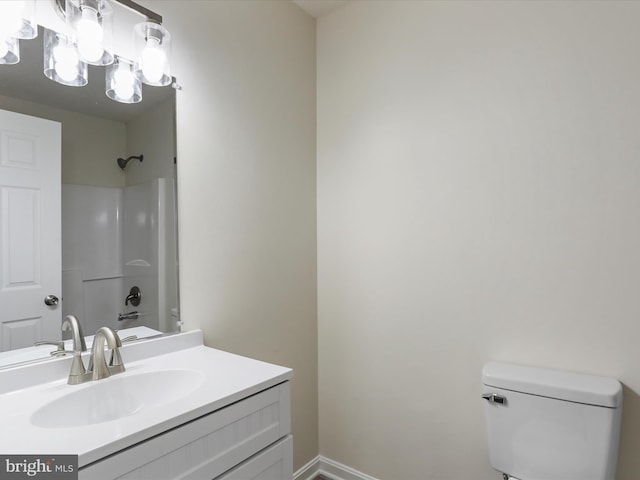 full bath with vanity, toilet, and bathing tub / shower combination