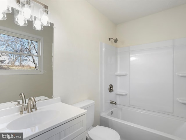 full bath featuring shower / washtub combination, vanity, and toilet