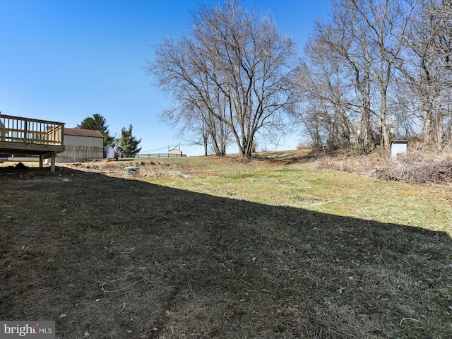 view of yard with a deck