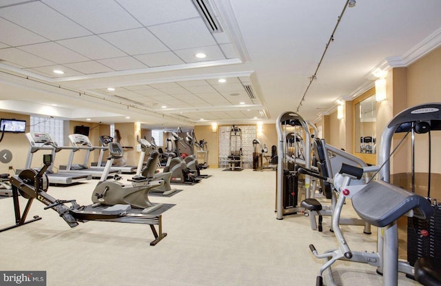 exercise room with light carpet, visible vents, crown molding, and recessed lighting