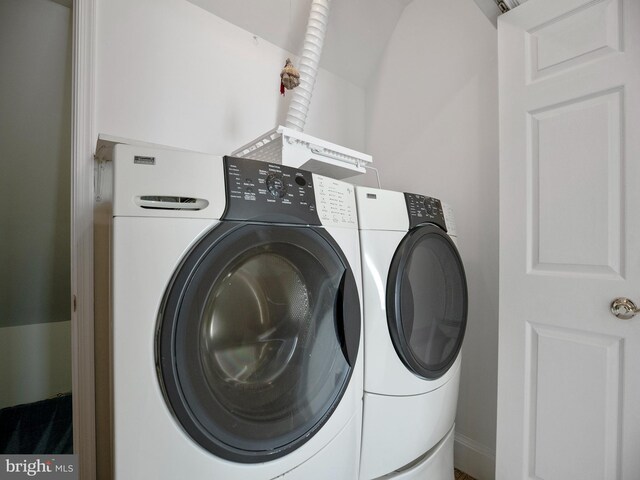 laundry area with laundry area and washing machine and dryer