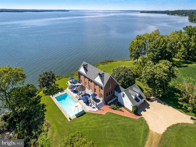 drone / aerial view with a water view