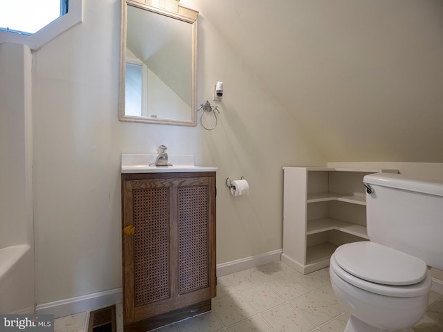 half bathroom with visible vents, toilet, vanity, and baseboards