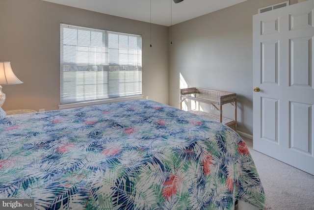 bedroom with carpet and visible vents