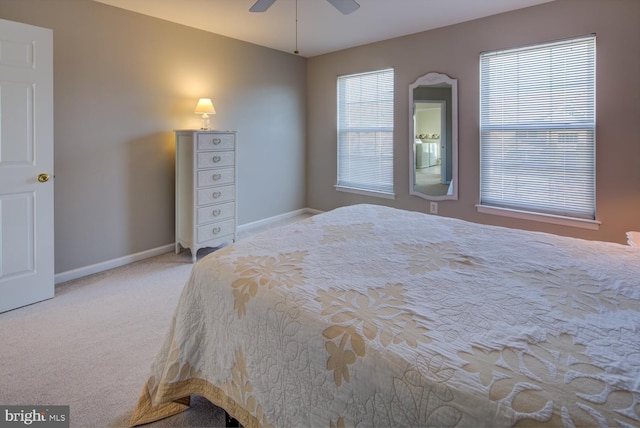 bedroom with carpet flooring, ceiling fan, and baseboards