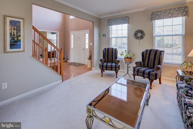 carpeted living area featuring ornamental molding, stairway, plenty of natural light, and baseboards