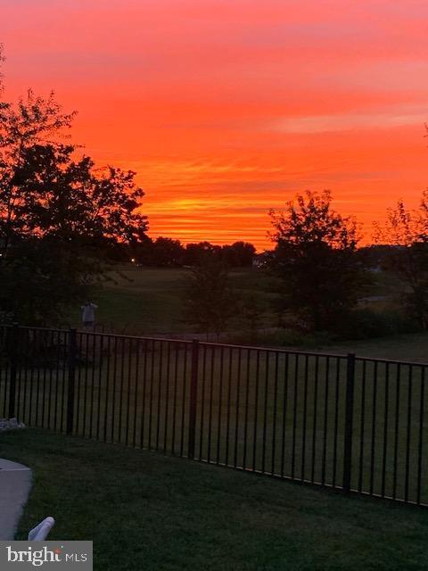 yard at dusk with fence