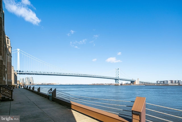 view of water feature with a city view