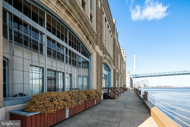 view of building exterior with a water view