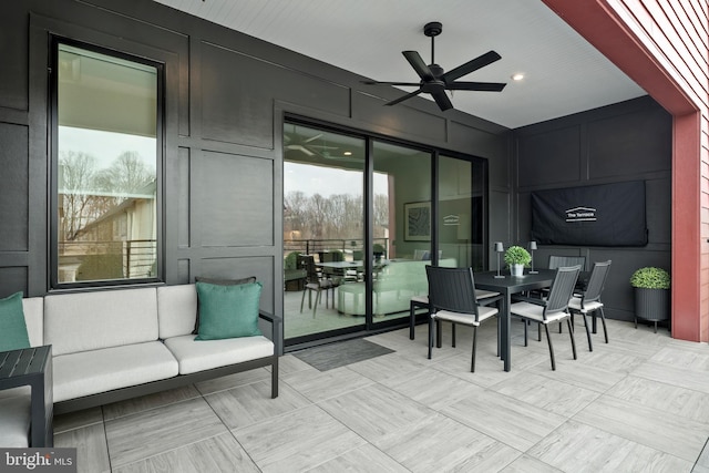 view of patio / terrace featuring ceiling fan and outdoor dining space